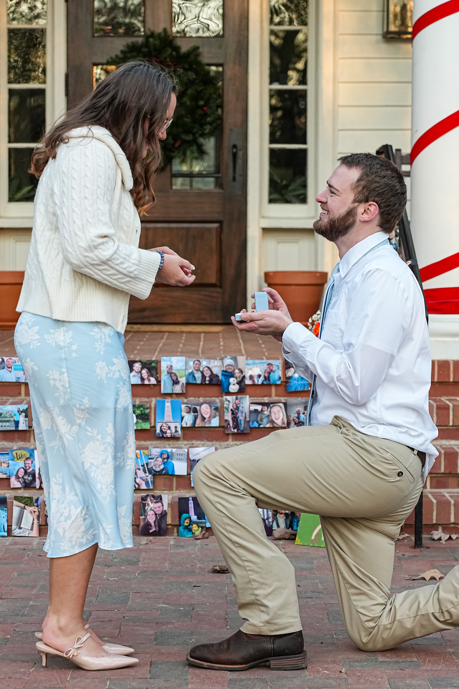Owen and Danielle holding hands and walking away from the camera.